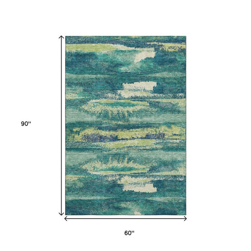 5' X 8' Emerald Ivory And Teal Abstract Washable Area Rug With UV Protection