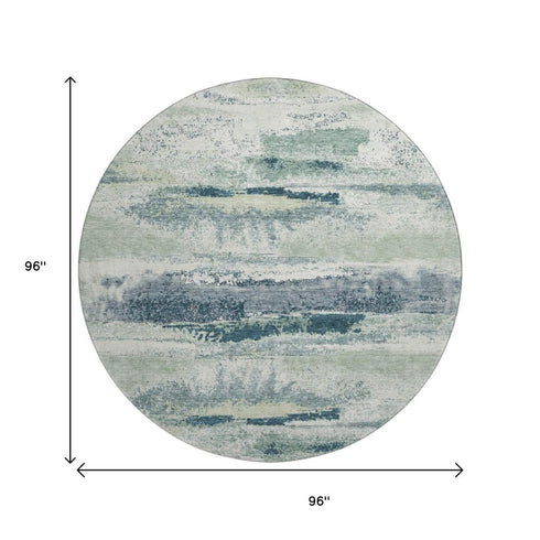 8' Mint Green Ivory And Blue Abstract Washable Round Rug With UV Protection