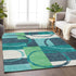 5' X 8' Teal Ivory And Green Geometric Washable Area Rug With UV Protection