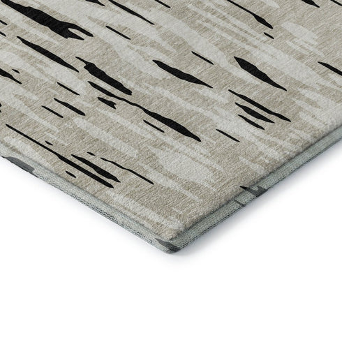 5' X 8' Black And Ivory Abstract Washable Area Rug With UV Protection