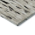 5' X 8' Black And Ivory Abstract Washable Area Rug With UV Protection