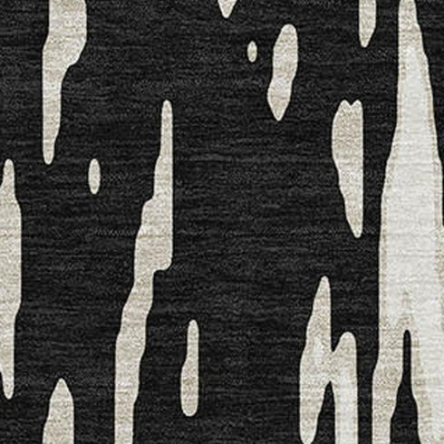 5' X 8' Black And Ivory Abstract Washable Area Rug With UV Protection
