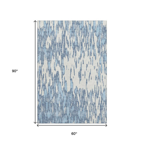 5' X 8' Denim Blue And Ivory Abstract Washable Area Rug With UV Protection