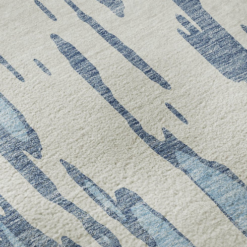 5' X 8' Denim Blue And Ivory Abstract Washable Area Rug With UV Protection