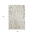 5' X 8' Ivory And Beige Abstract Washable Area Rug With UV Protection