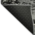 5' X 8' Black And Ivory Abstract Washable Area Rug With UV Protection