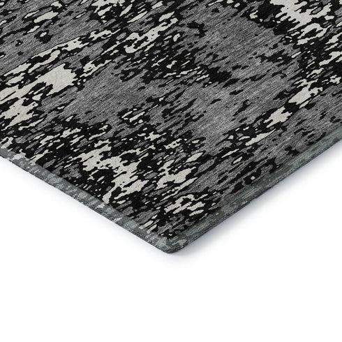 5' X 8' Black And Ivory Abstract Washable Area Rug With UV Protection