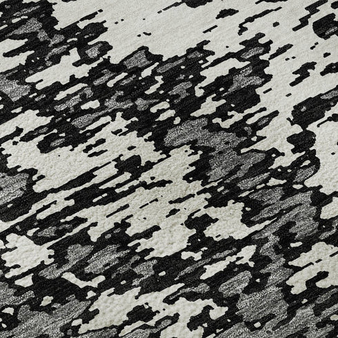 5' X 8' Black And Ivory Abstract Washable Area Rug With UV Protection