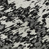 5' X 8' Black And Ivory Abstract Washable Area Rug With UV Protection