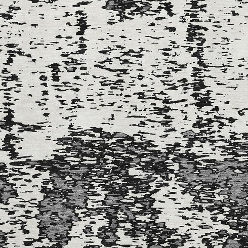 5' X 8' Black And Ivory Abstract Washable Area Rug With UV Protection