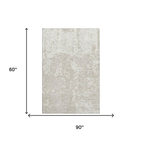 5' X 8' Ivory And Beige Abstract Washable Area Rug With UV Protection