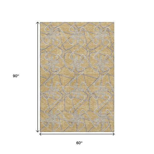 5' X 8' Gold And Ivory Geometric Washable Area Rug With UV Protection