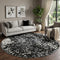 8' Black Gray And Ivory Abstract Washable Round Rug With UV Protection