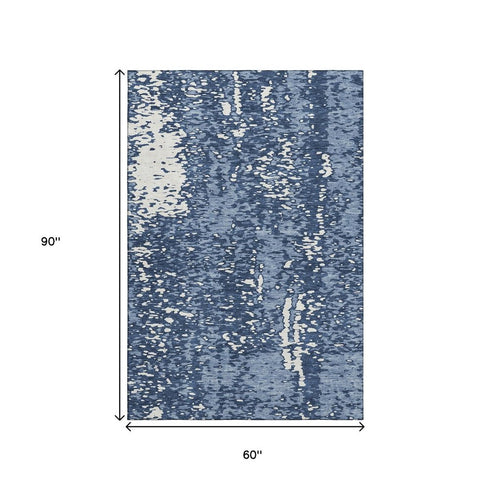 5' X 8' Denim Blue And Ivory Abstract Washable Area Rug With UV Protection