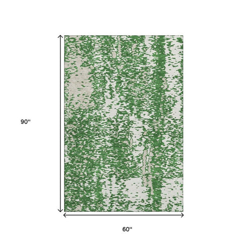 5' X 8' Emerald And Ivory Abstract Washable Area Rug With UV Protection