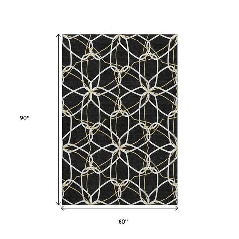 5' X 8' Black Ivory And Gold Geometric Washable Area Rug With UV Protection