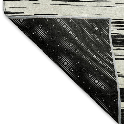 8' Black And Ivory Striped Washable Round Rug With UV Protection