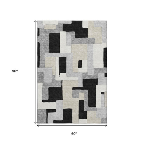 5' X 8' Black Ivory And Beige Geometric Washable Area Rug With UV Protection
