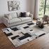 5' X 8' Black Ivory And Beige Geometric Washable Area Rug With UV Protection