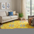 8' Yellow Blue And Red Geometric Washable Round Rug With UV Protection