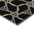 5' X 8' Black Beige And Ivory Geometric Washable Area Rug With UV Protection