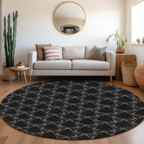 8' Black And Ivory Geometric Washable Round Rug With UV Protection