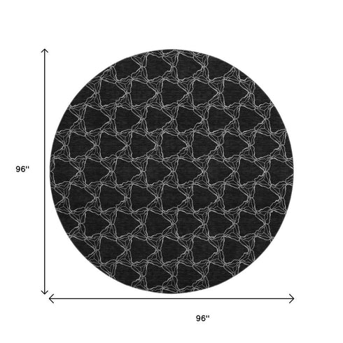 8' Black And Ivory Geometric Washable Round Rug With UV Protection