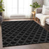 9' X 12' Black And Ivory Geometric Washable Area Rug With UV Protection