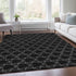 9' X 12' Black And Ivory Geometric Washable Area Rug With UV Protection