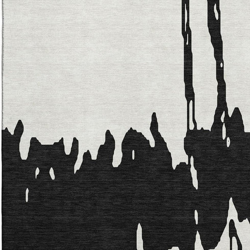 5' X 8' Black And Ivory Abstract Washable Area Rug With UV Protection