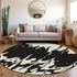 8' Black And Ivory Abstract Washable Round Rug With UV Protection