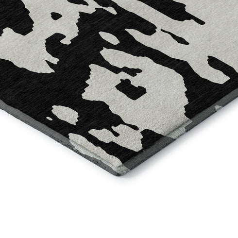 8' Black And Ivory Abstract Washable Round Rug With UV Protection