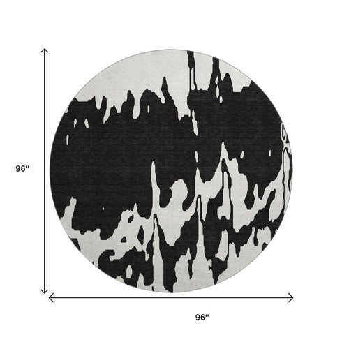 8' Black And Ivory Abstract Washable Round Rug With UV Protection