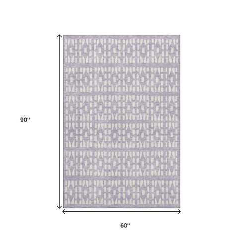 5' X 8' Lavender And Ivory Geometric Washable Area Rug With UV Protection