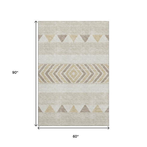 5' X 8' Beige Ivory And Tan Southwestern Washable Area Rug With UV Protection