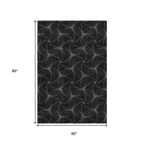 5' X 8' Black And Ivory Geometric Washable Area Rug With UV Protection