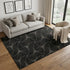 5' X 8' Black And Ivory Geometric Washable Area Rug With UV Protection