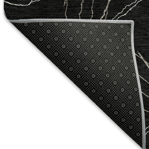 5' X 8' Black And Ivory Geometric Washable Area Rug With UV Protection