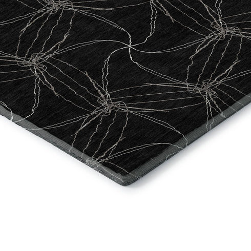 5' X 8' Black And Ivory Geometric Washable Area Rug With UV Protection