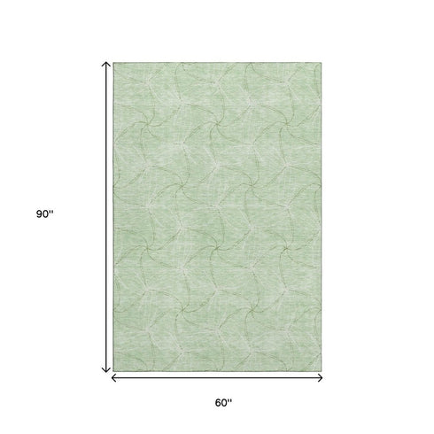 5' X 8' Mint Green And Ivory Geometric Washable Area Rug With UV Protection