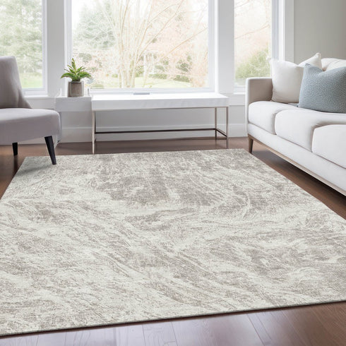 9' X 12' Beige And Ivory Abstract Washable Area Rug With UV Protection