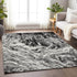 9' X 12' Black And Ivory Abstract Washable Area Rug With UV Protection
