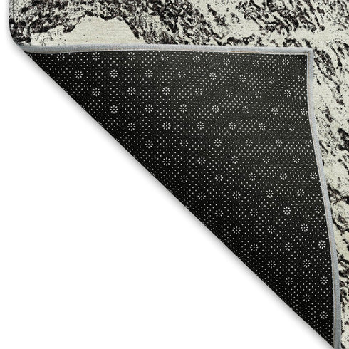 9' X 12' Black And Ivory Abstract Washable Area Rug With UV Protection