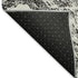 9' X 12' Black And Ivory Abstract Washable Area Rug With UV Protection