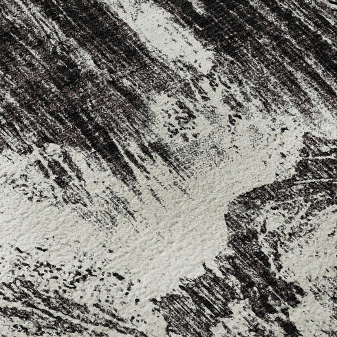9' X 12' Black And Ivory Abstract Washable Area Rug With UV Protection