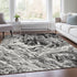 9' X 12' Black And Ivory Abstract Washable Area Rug With UV Protection