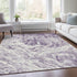9' X 12' Purple And Ivory Abstract Washable Area Rug With UV Protection