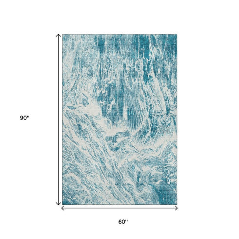 5' X 8' Teal And Ivory Abstract Washable Area Rug With UV Protection