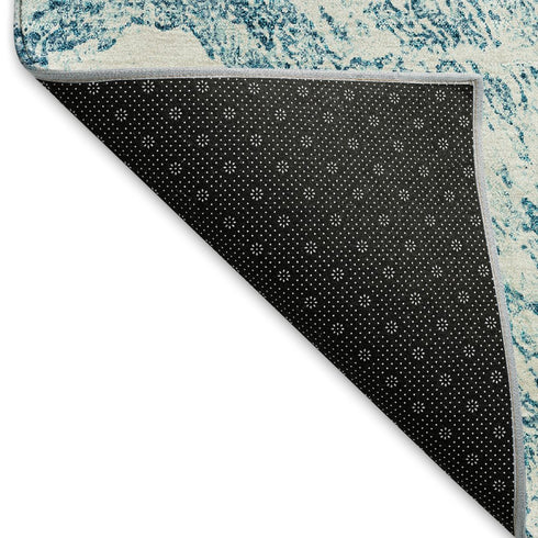 5' X 8' Teal And Ivory Abstract Washable Area Rug With UV Protection