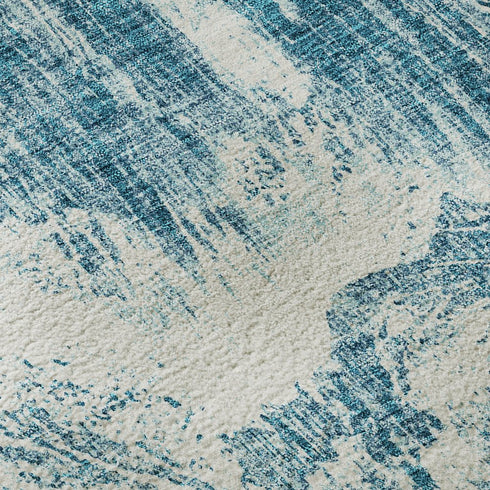 5' X 8' Teal And Ivory Abstract Washable Area Rug With UV Protection